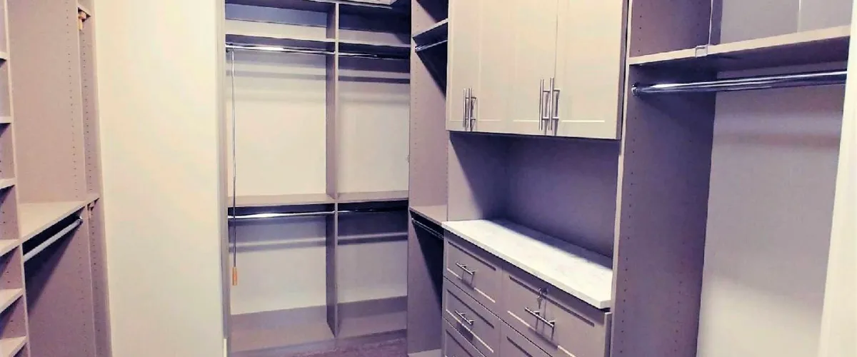 a white cabinet with white drawers