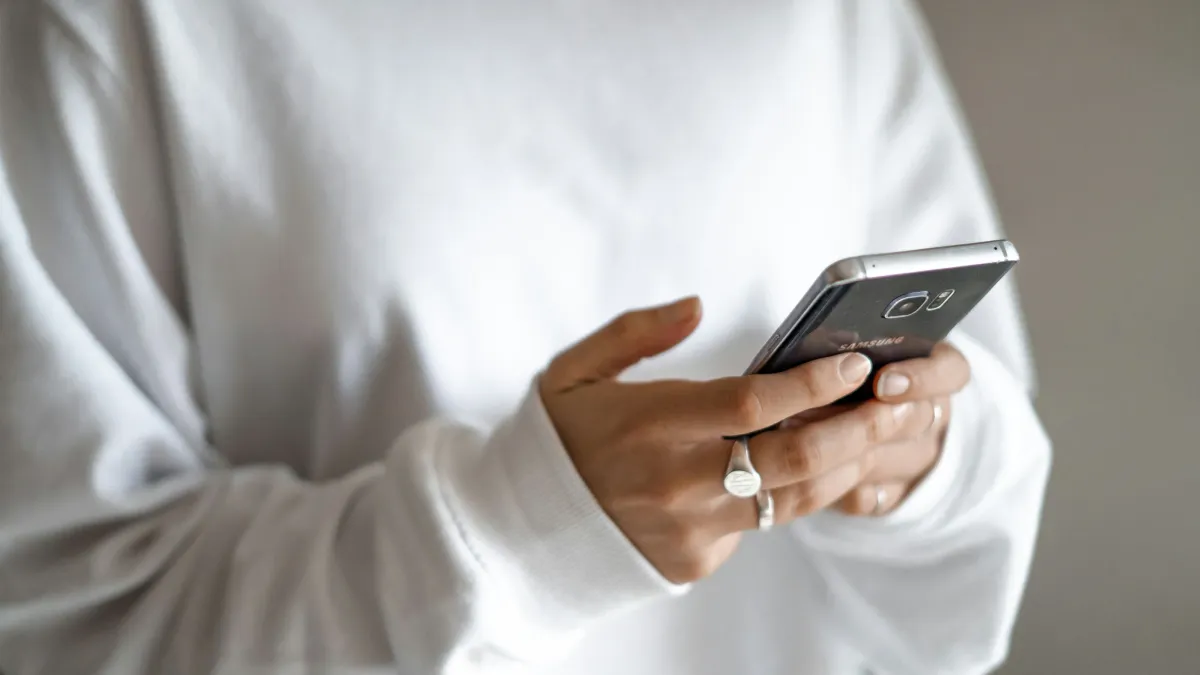 a man holding a cell phone