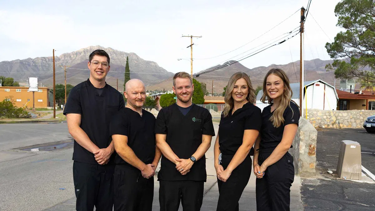 A Nexia practice team in front of the Franklin Mountains in El Paso