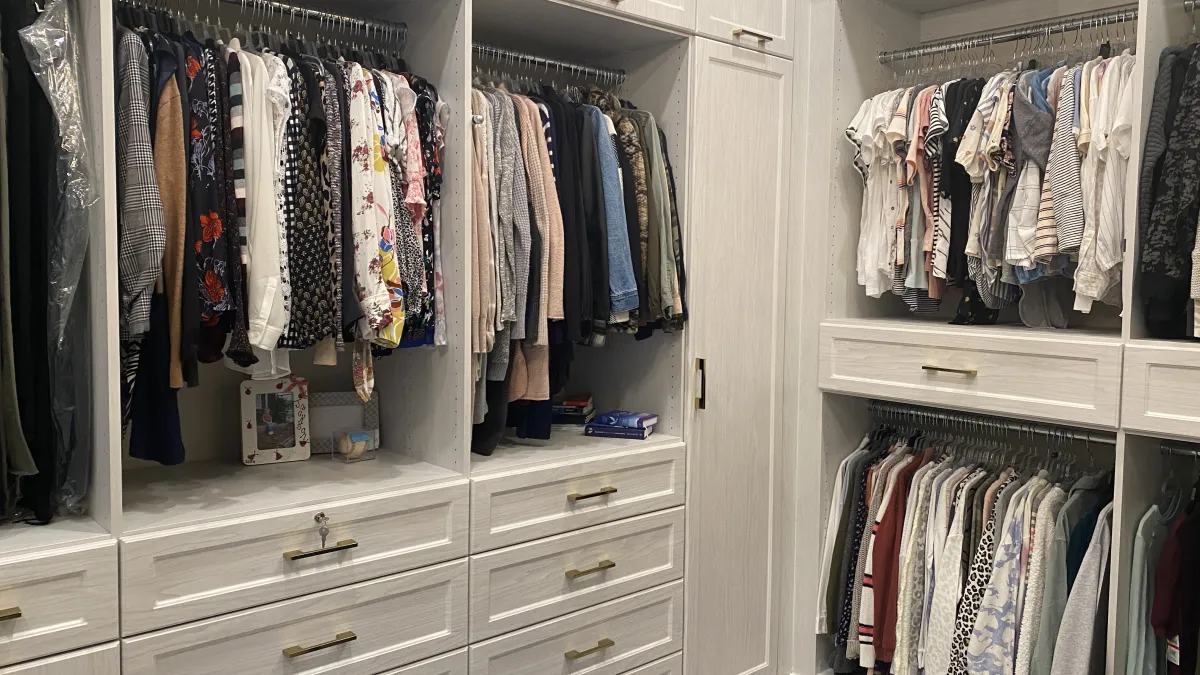 a closet with clothes