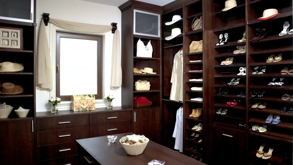 a room with a table and shelves