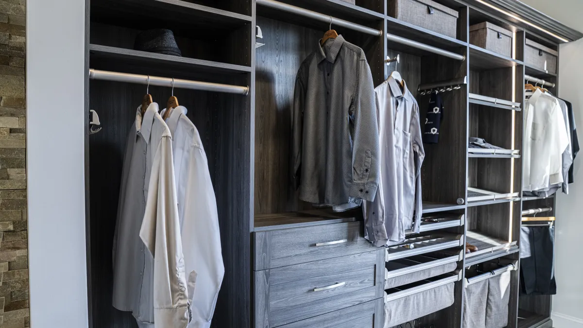 a closet with clothes