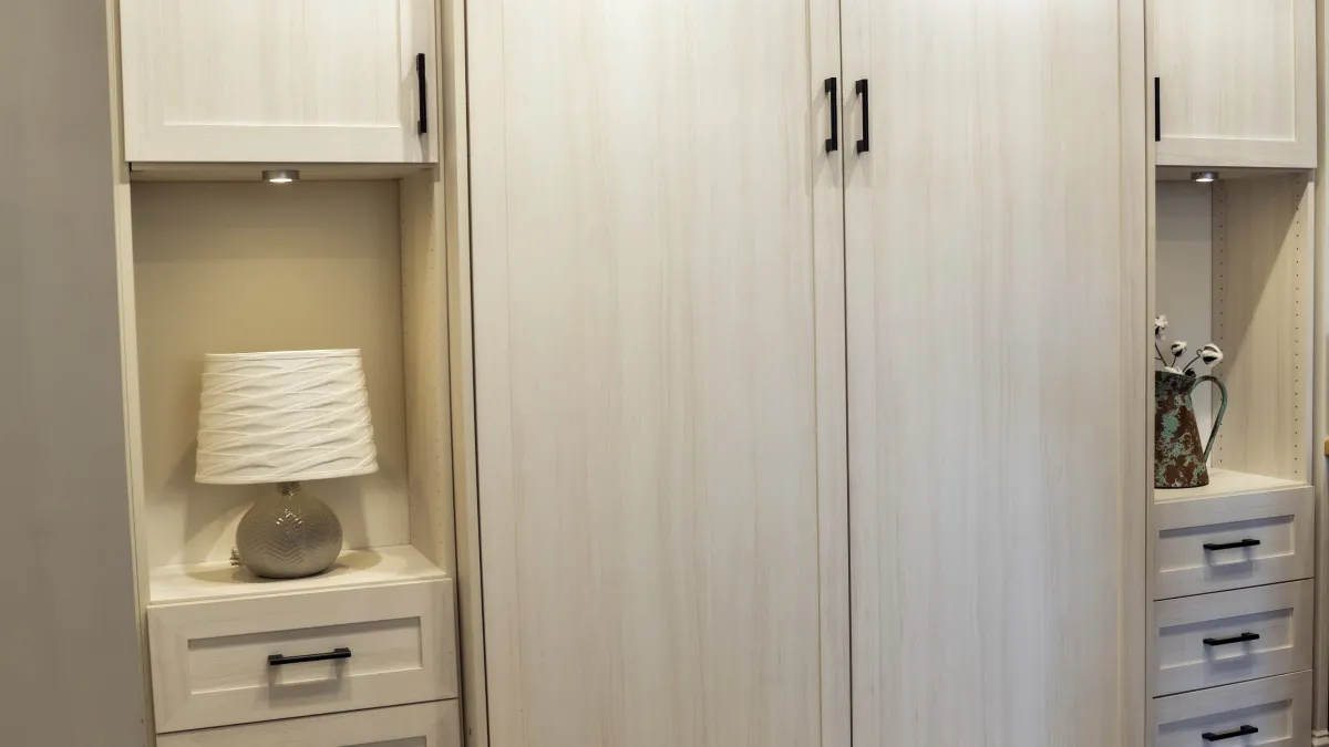 a white cabinet in a room