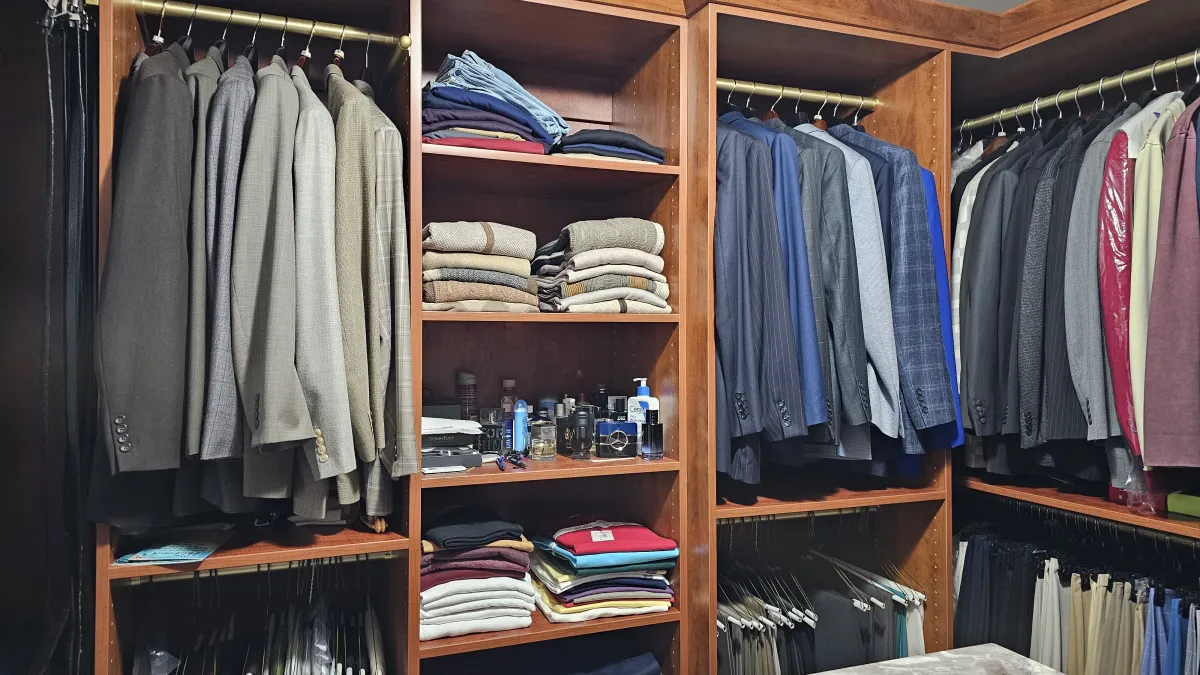 a closet with clothes