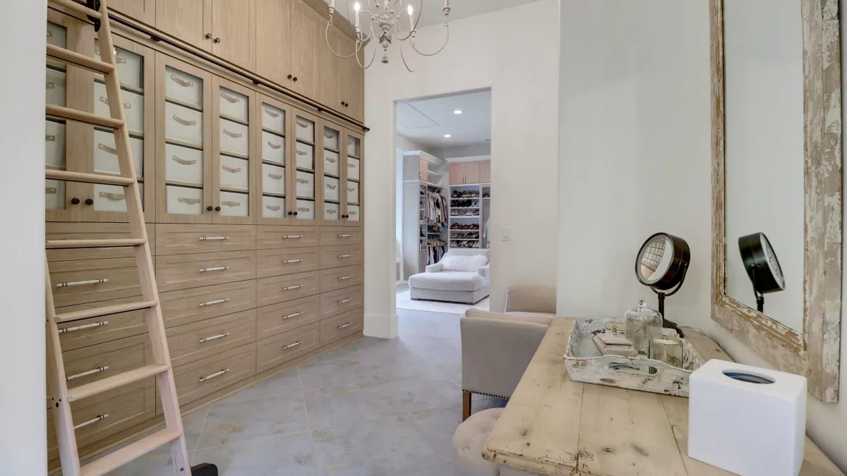 a closet with a large vanity