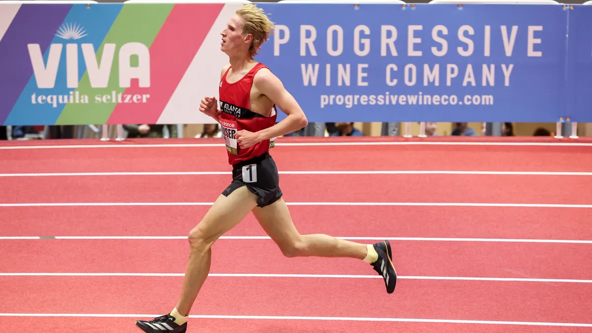 a woman running on a track