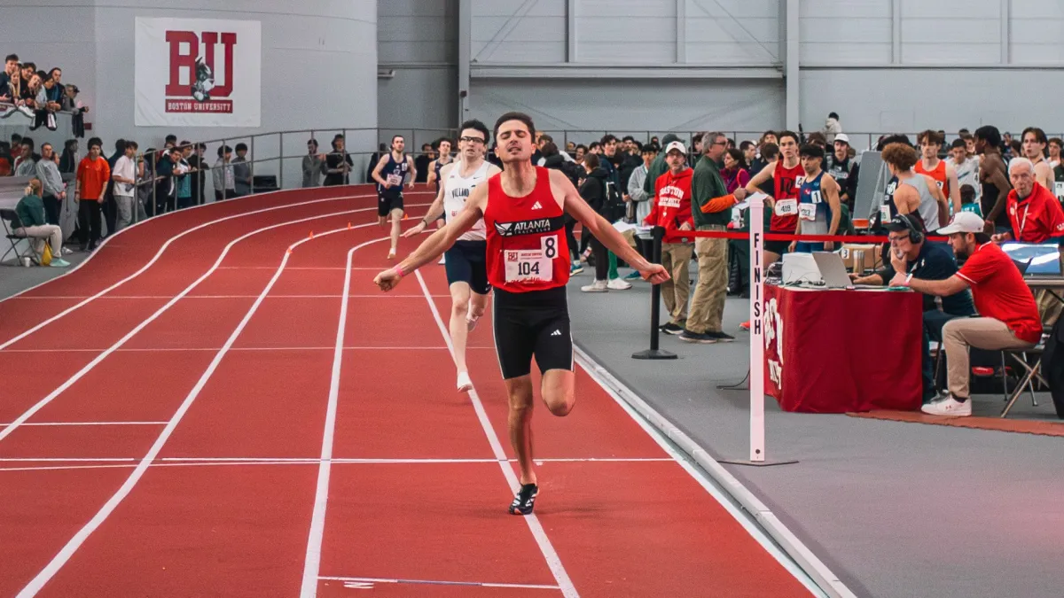 a woman running on a track