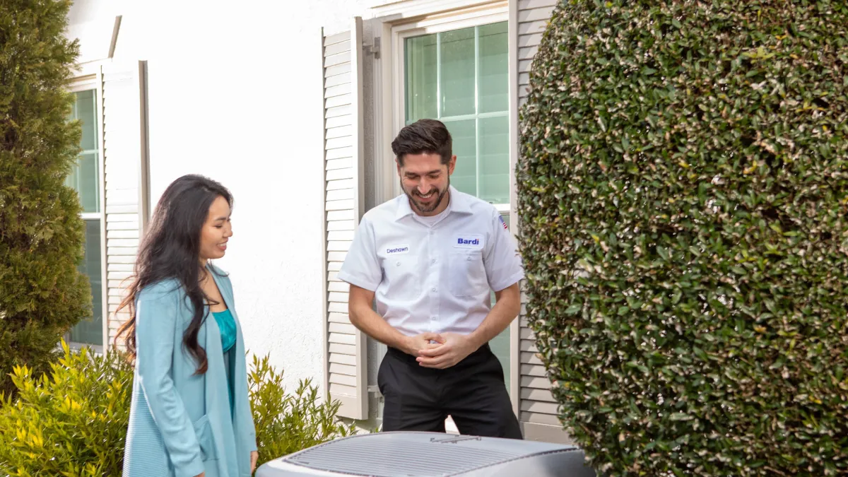 Bardi technician speaking to their