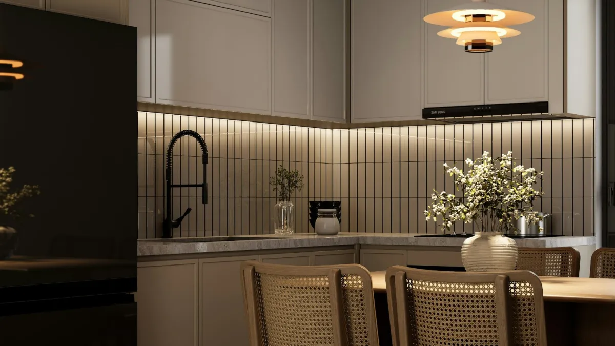 Modern kitchen with wooden dining table, cane-back chairs, pendant light, and frosted glass door with silhouette.