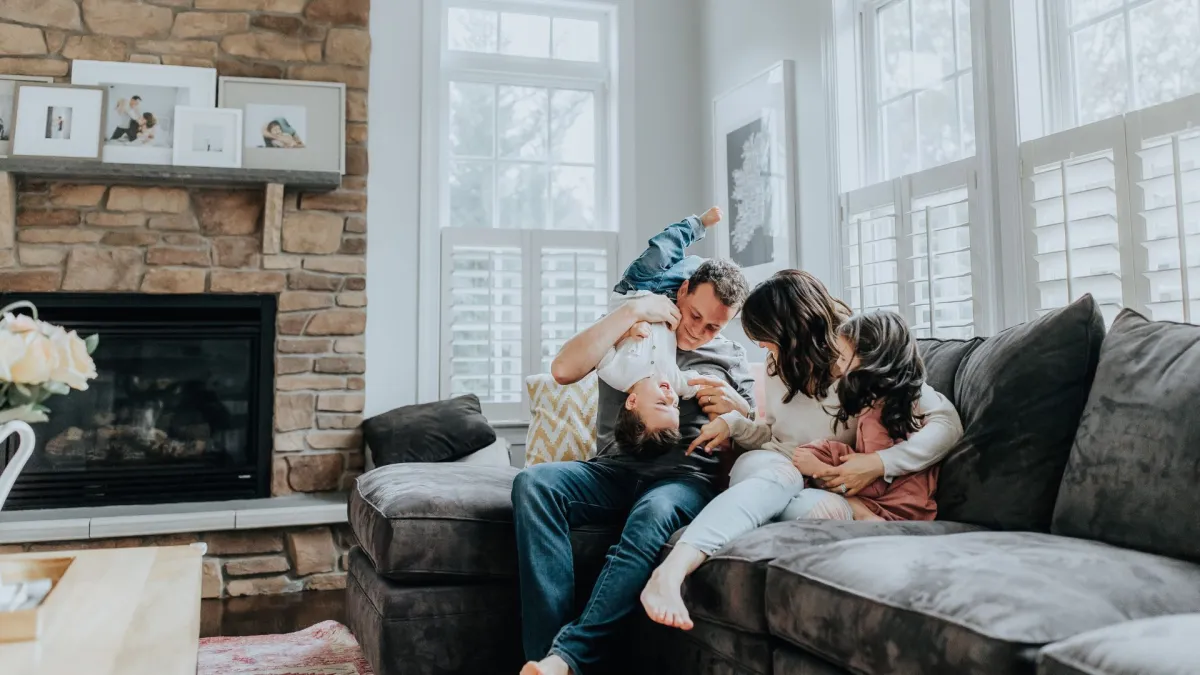 a group of people sitting on a couch