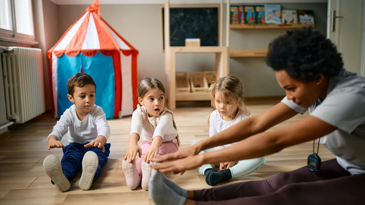 children and their teacher doing ABA therapy in Kennesaw, GA