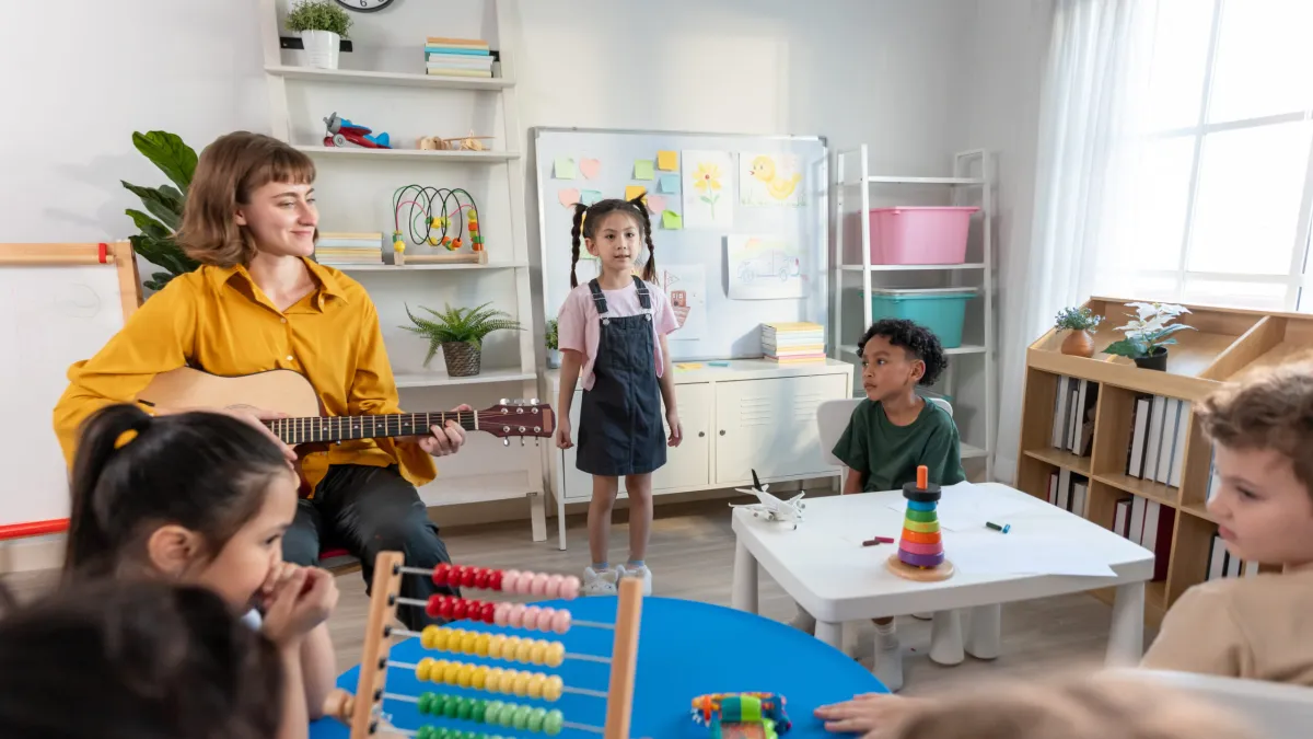 a group of children with autism and their teacher in Dunwoody, GA