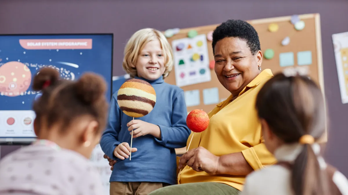 a teacher teaching her autistic students in Marietta, GA