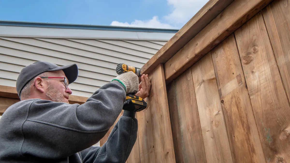 a man holding a hammer