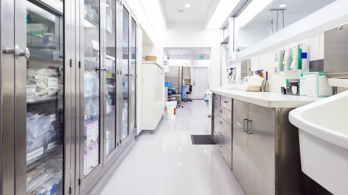 a long hallway with glass doors