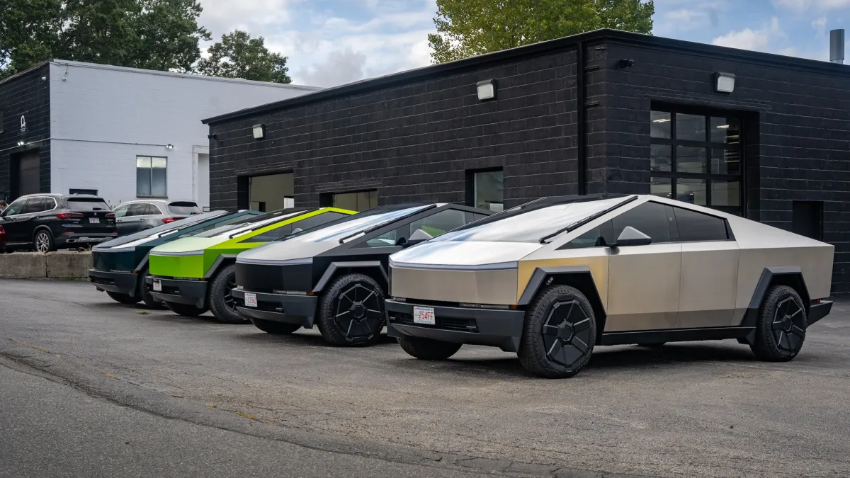 a row of cars parked outside a building