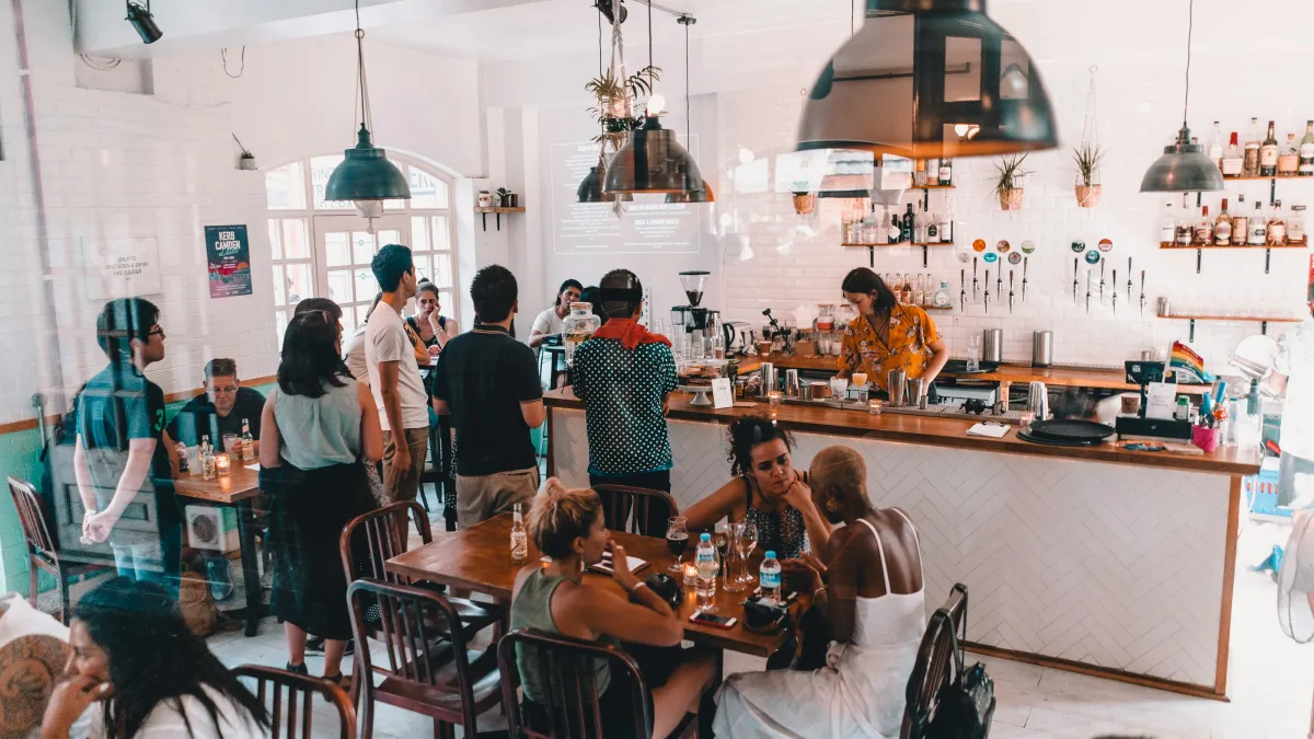 a group of people in a restaurant