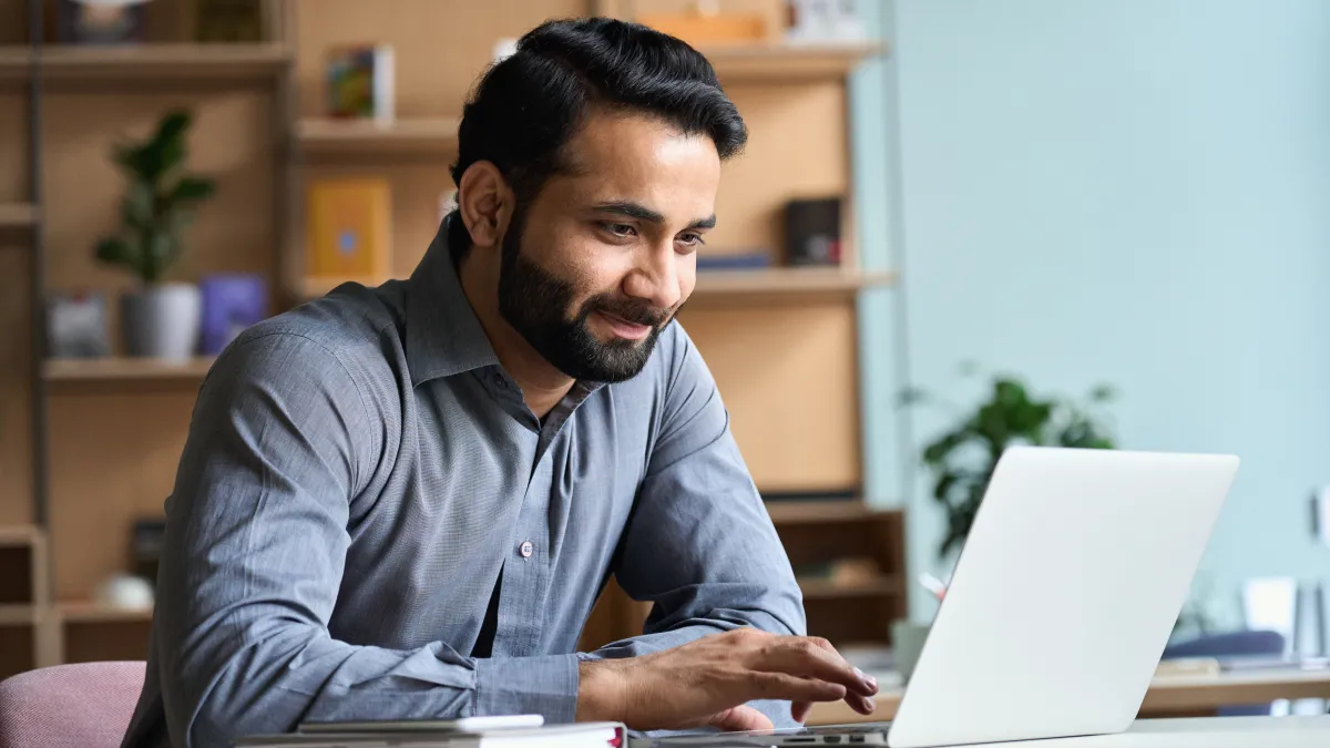 a man working on his laptop