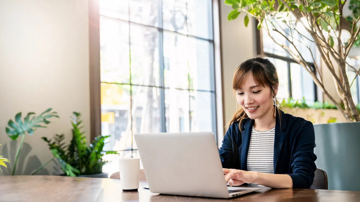 a woman working on her laptop
