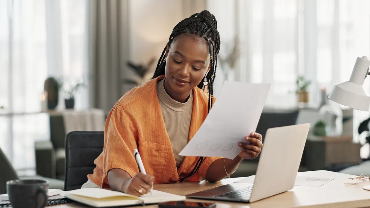 a person holding a piece of paper
