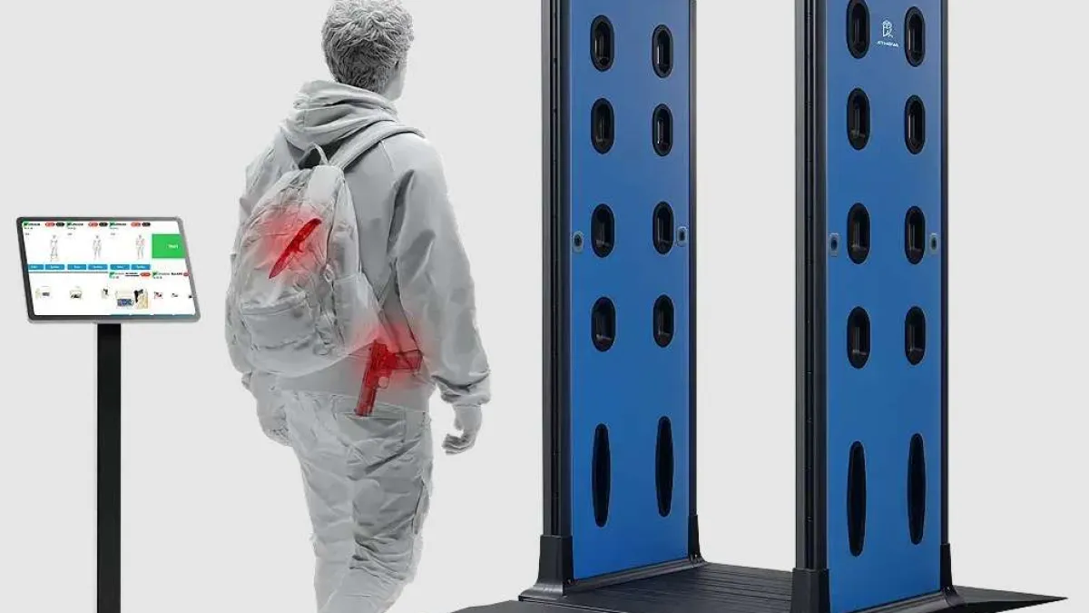 Person with concealed red-highlighted weapons approached blue security scanner gates with digital monitor nearby