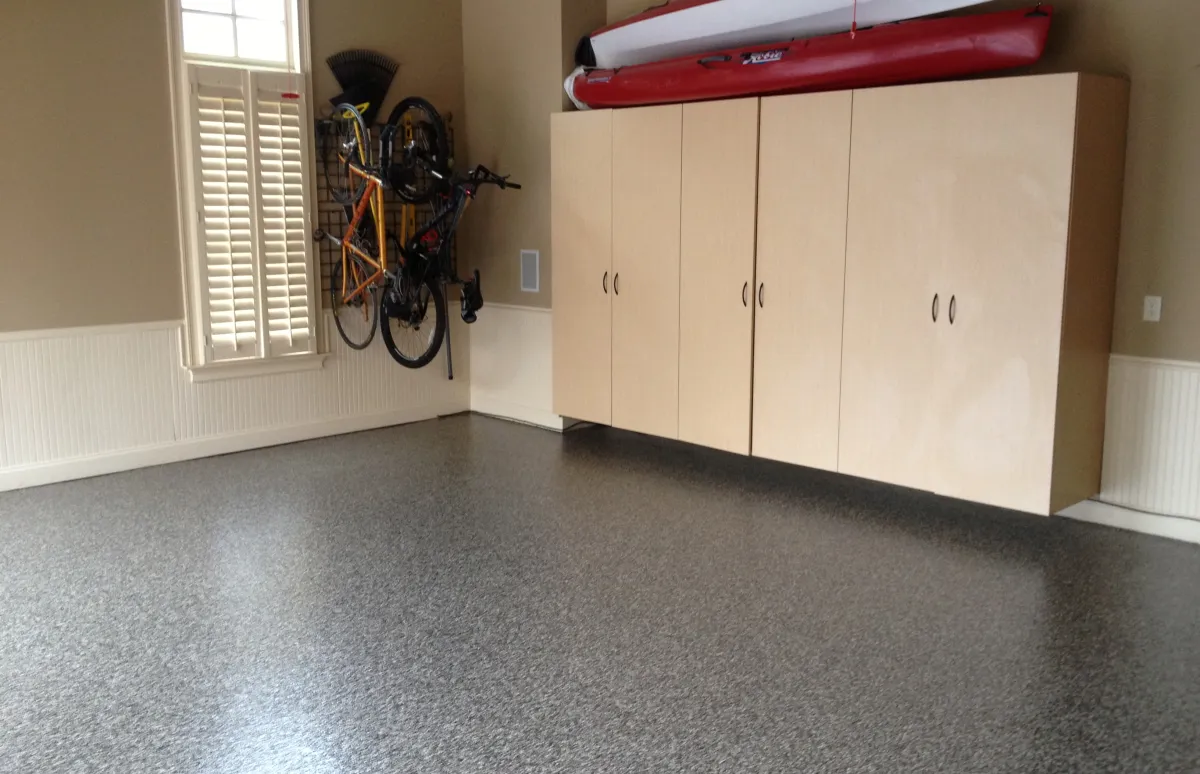 garage with cabinets and bicycles