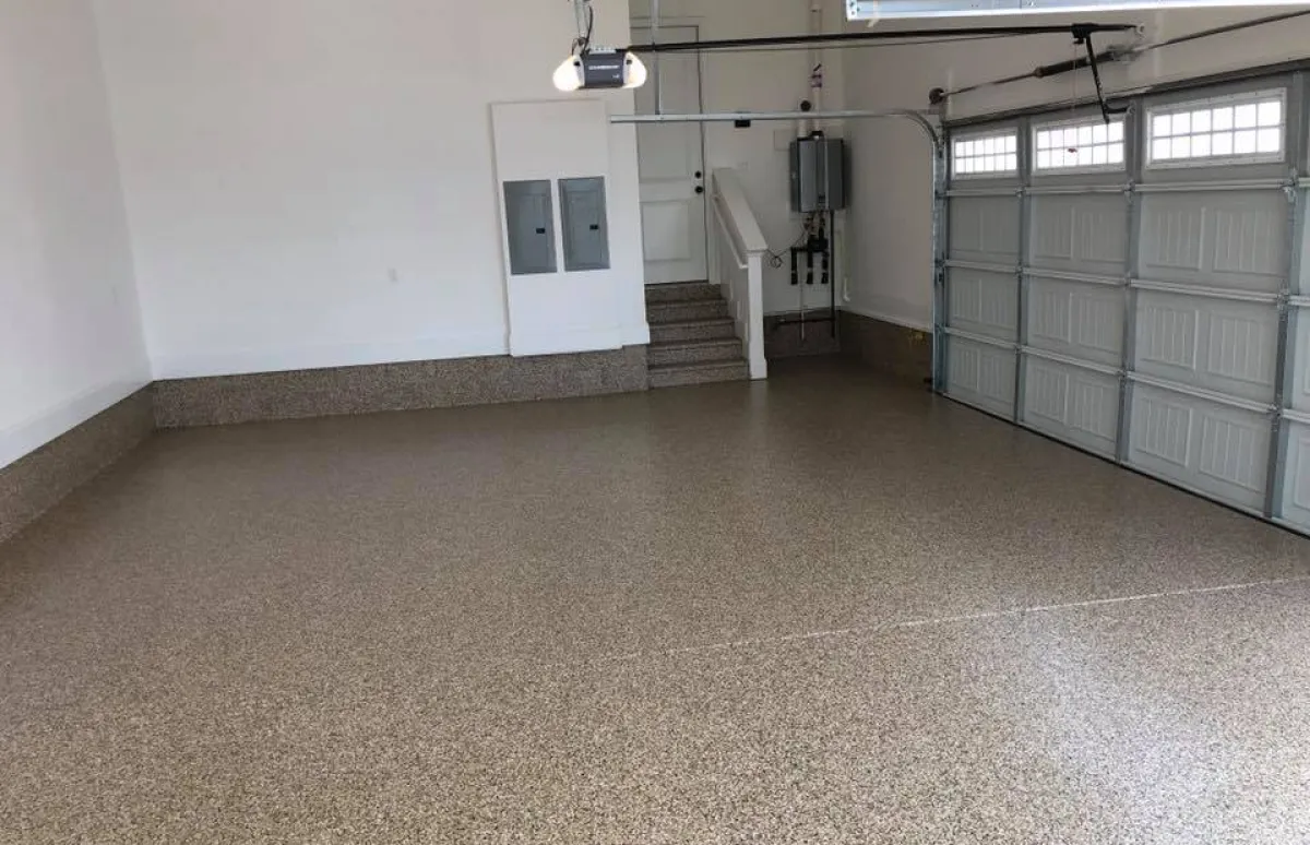 garage with a door and water heater