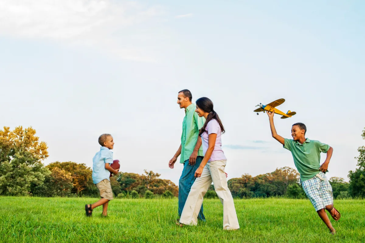 a family playing with a drone