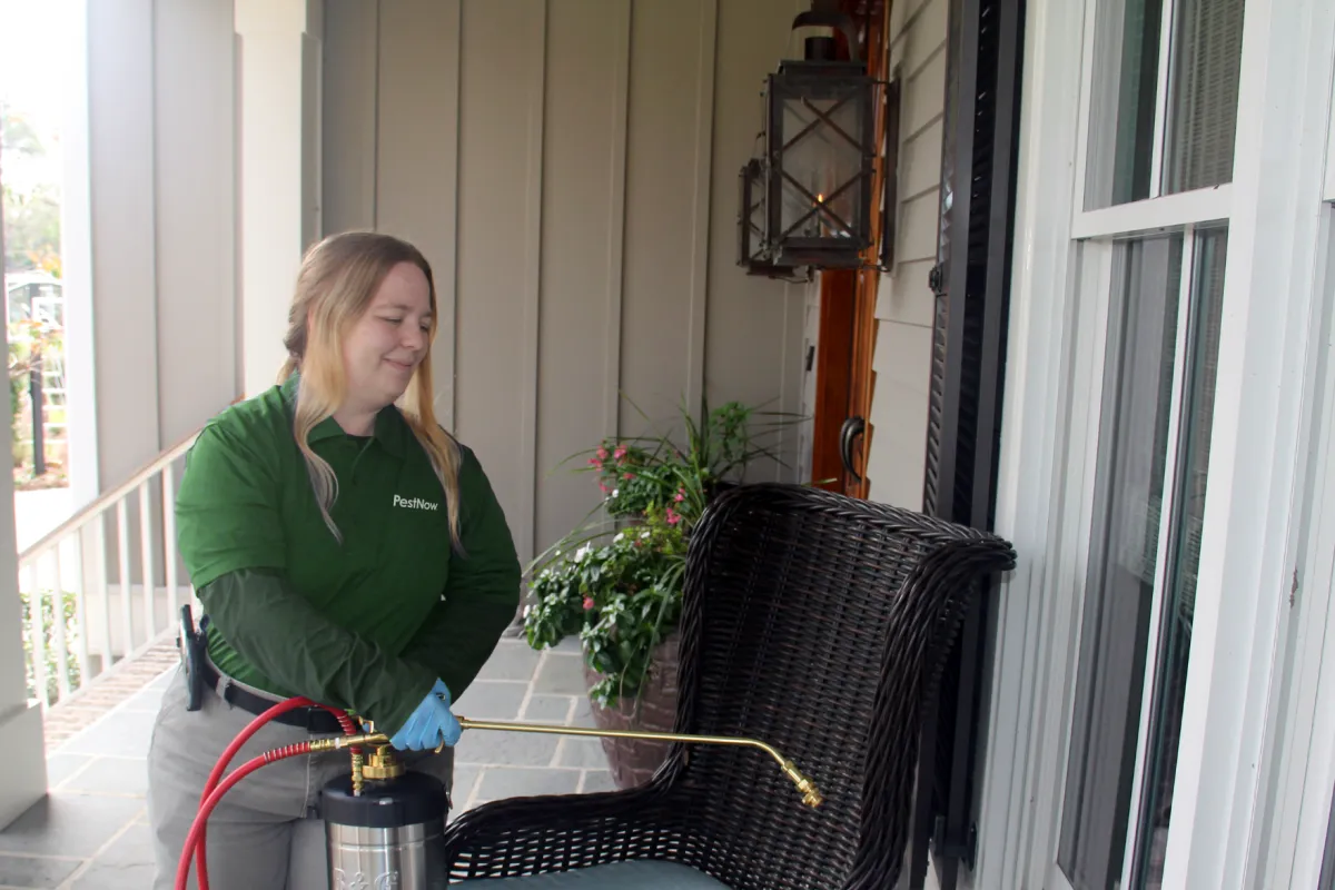 a person holding a hose