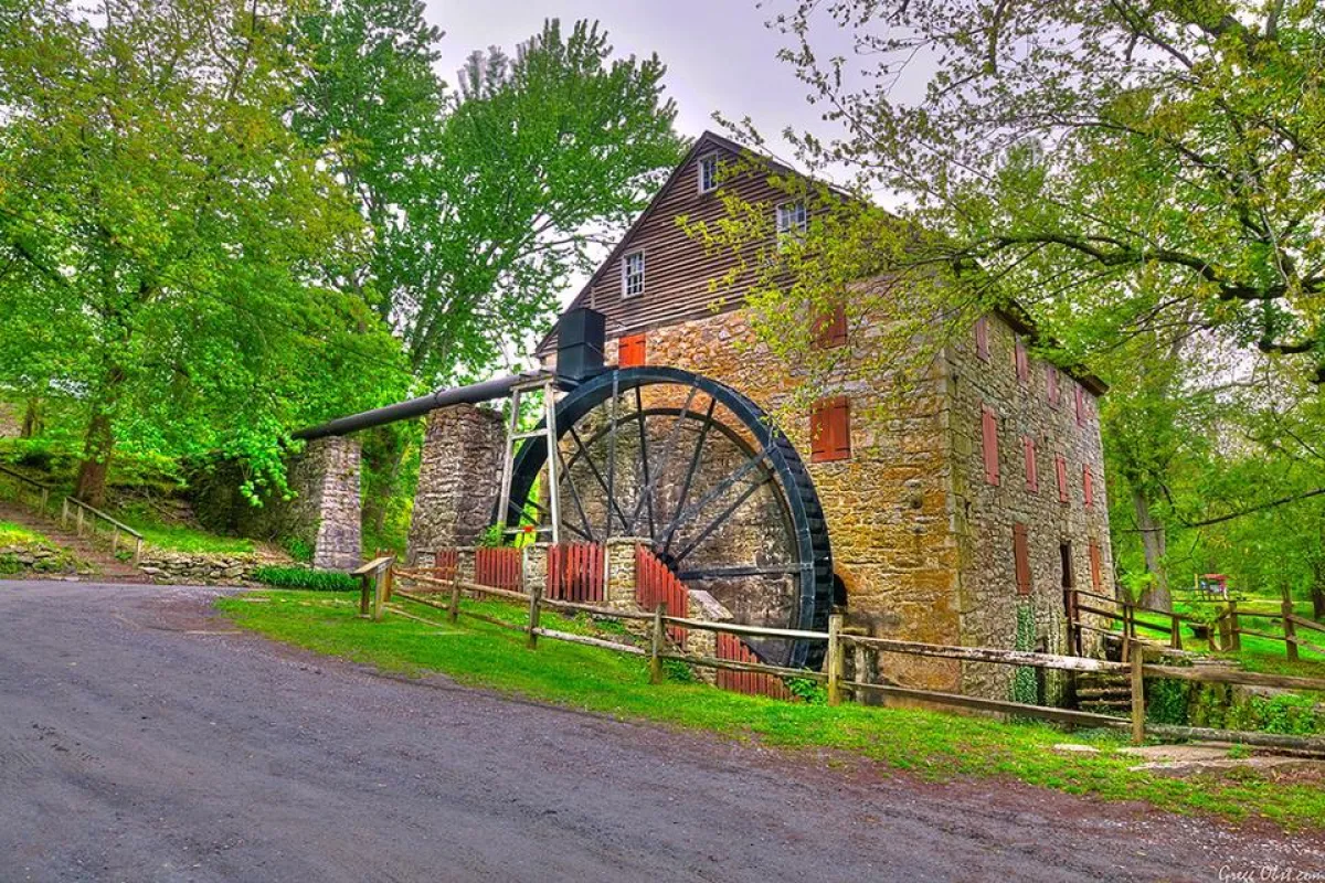 a brick building with a wheel