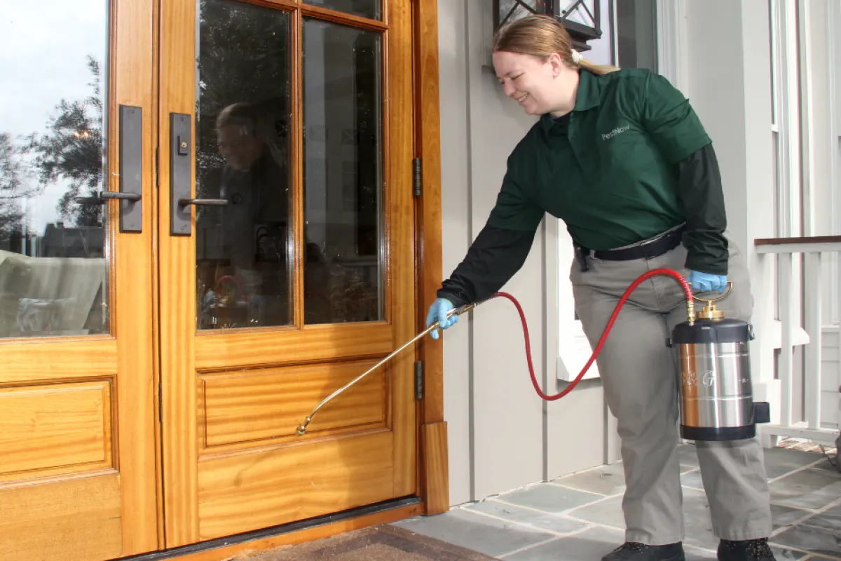 a person cleaning a door