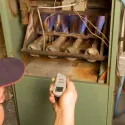 Technician performing a furnace tune-up
