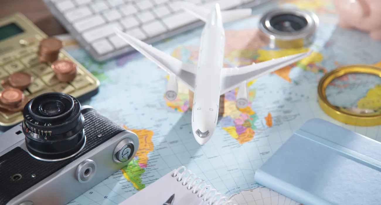 a close-up of a pen and a camera on a table