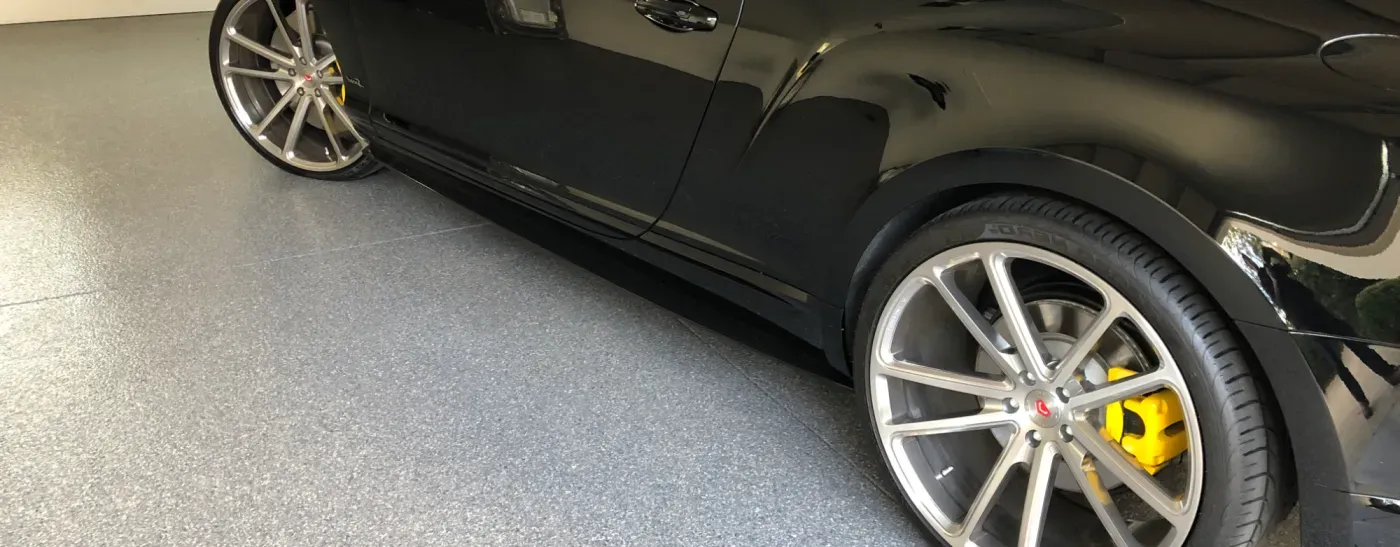 Sports car parked on epoxy floor coating in Elkhorn