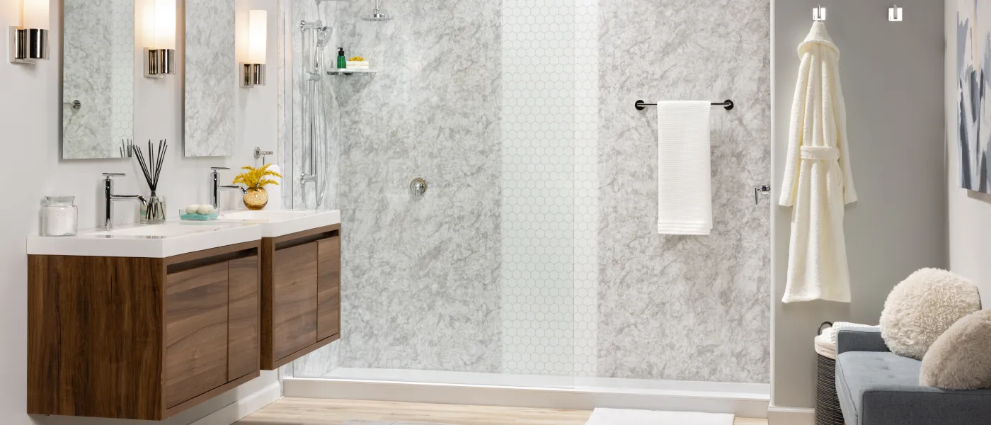 a bathroom with a large shower two floating vanities