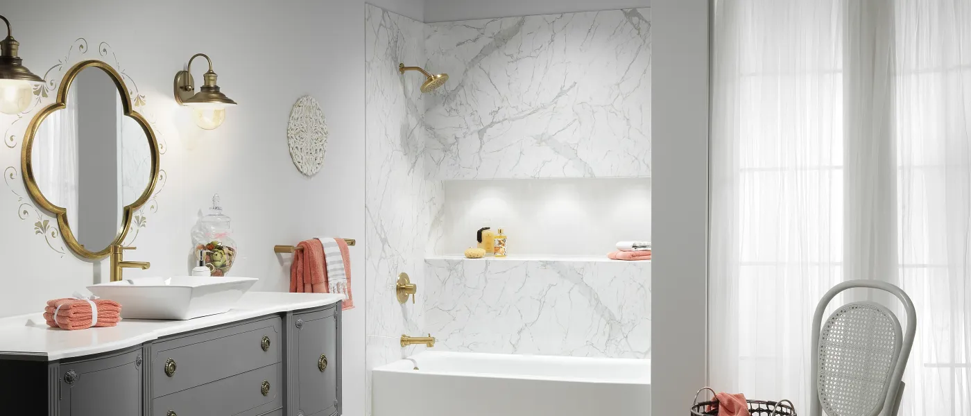 a bathroom with a tub and sink