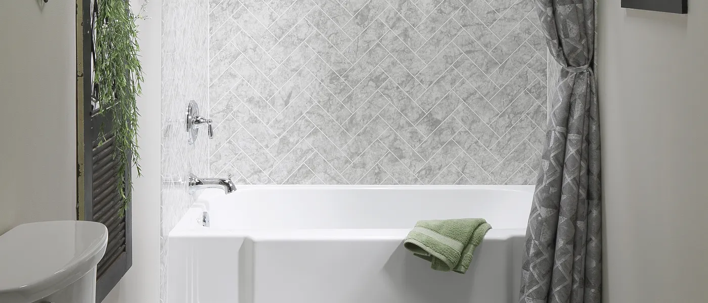 a bathroom with a tub toilet and sink