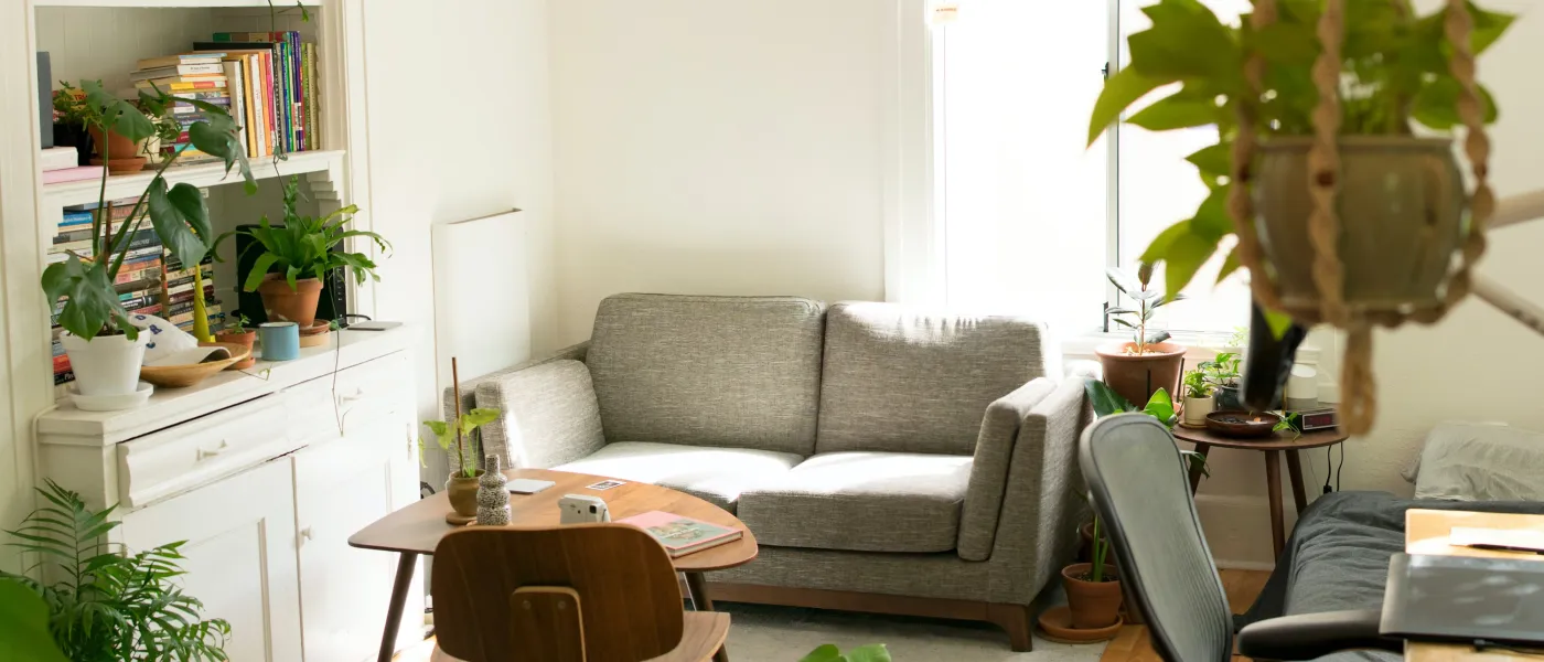 a living room filled with furniture and a fire place