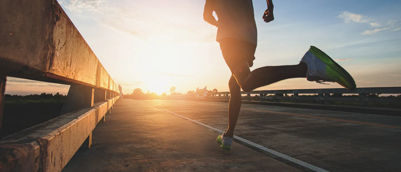 a person running on a bridge