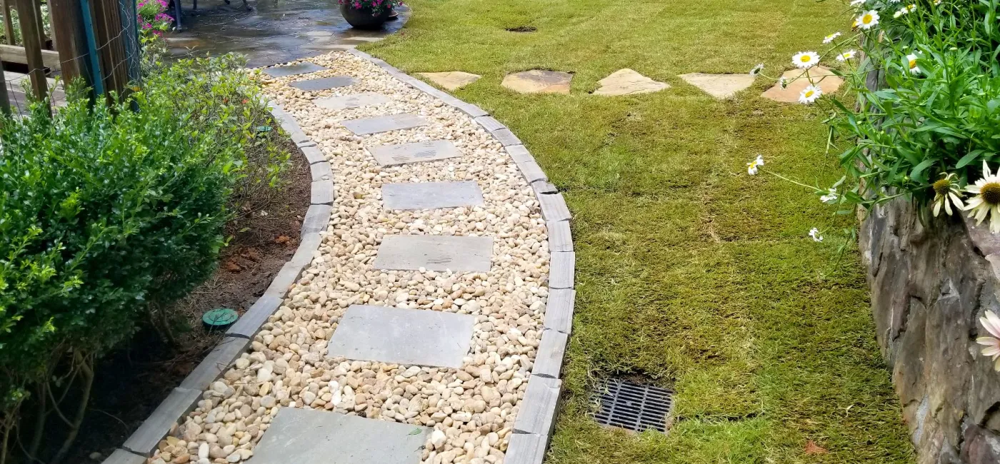 Egg rock walkway with stepping stones and border