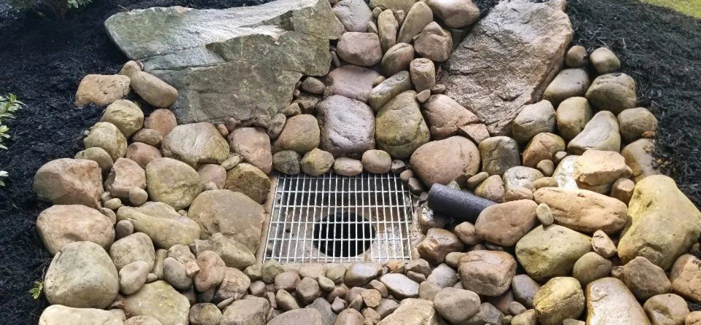 Large custom drain basin in Creekbed