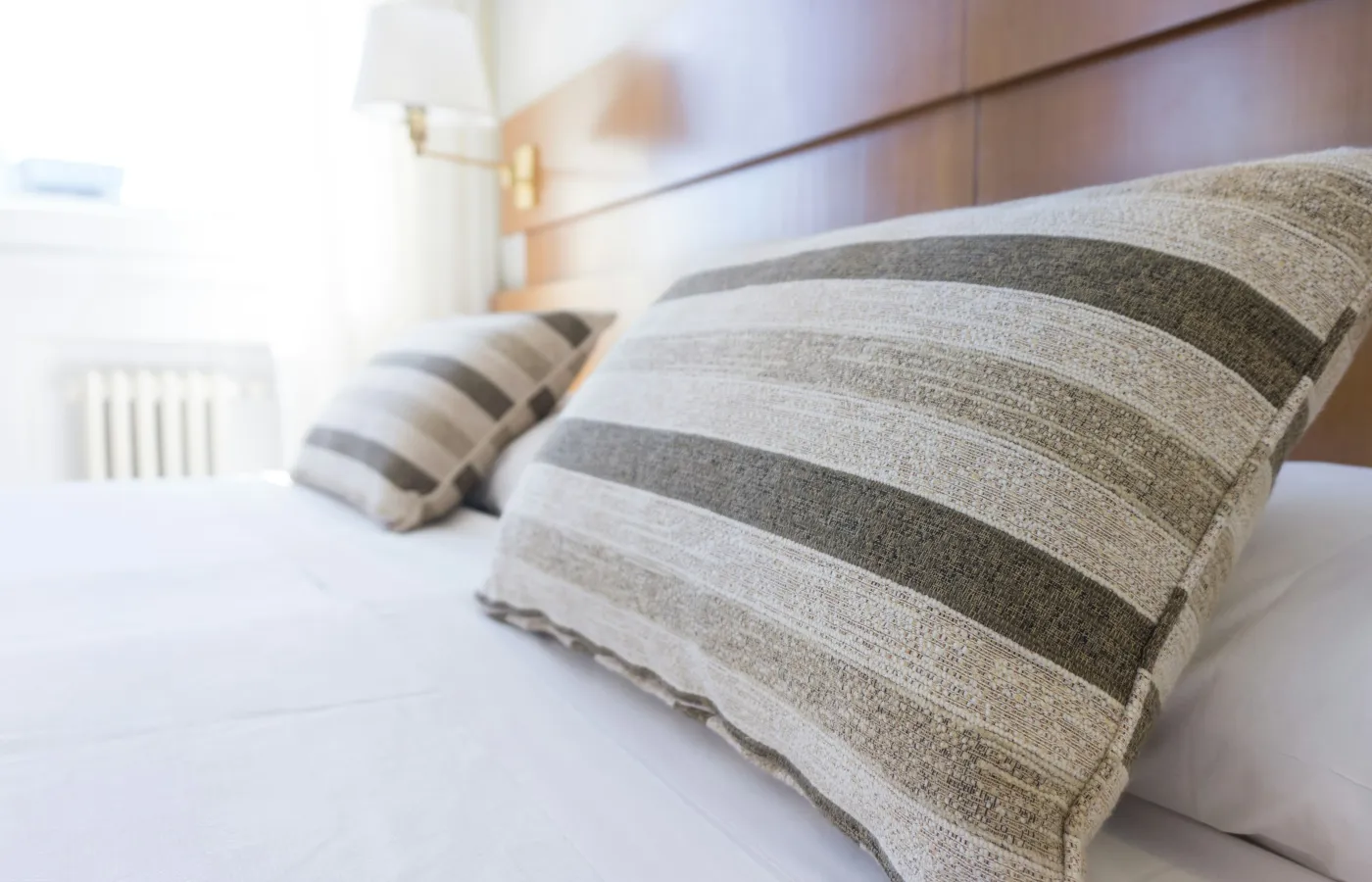 a bed with a pillow