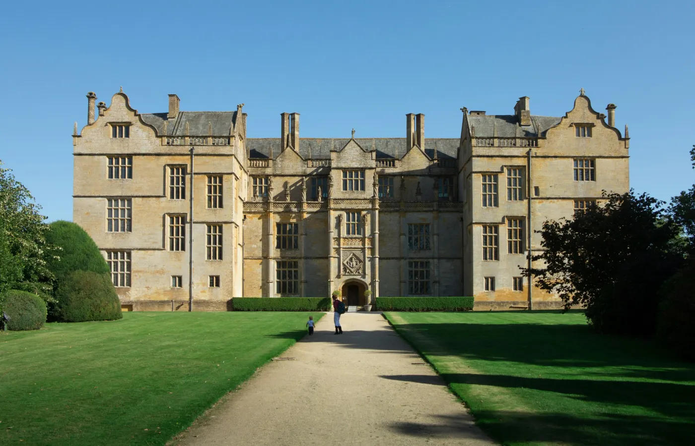 a large building with a path in front of it
