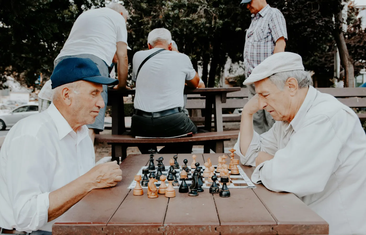 a group of men playing chess