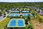an overhead view of the many tennis courts at NatureWalk