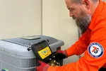 Estes Services Heating and Air Technician with a Heat Pump
