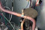 Commercial HVAC Repair and Maintenance on an RTU by The Air Company of GA.