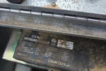 Wine Cellar Repair in Marietta 30064 by The Air Company of GA.  Close-up of a rusty metal hinge and control panel on a CellarCool refrigeration unit with visible model and serial numbers.