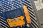 Residential HVAC Repair in Dunwoody 30338 by The Air Company of GA. Pressures are low on unit.  Fieldpiece digital manifold gauge connected to a Lennox HVAC unit showing pressure and temperature readings.