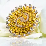 Pager to activate Yellow Sapphire Infinia Ring